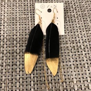 Black feathered earrings, gold tips